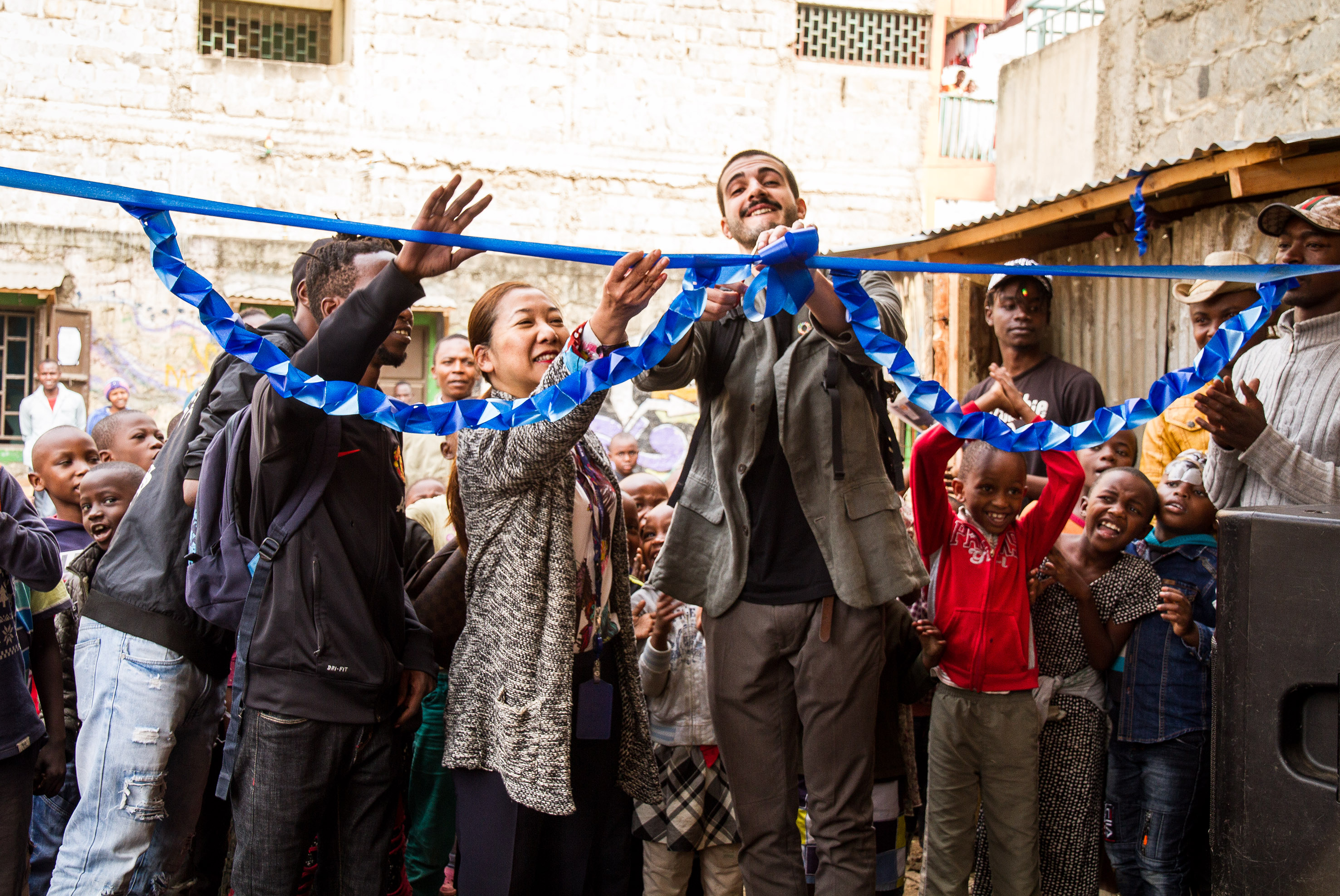 Kazumi Ogawa, UN-Habitat Chief of Staff, and Ivan Segato, Architect from ARVET, cut the ribbon to open The Children's Corner