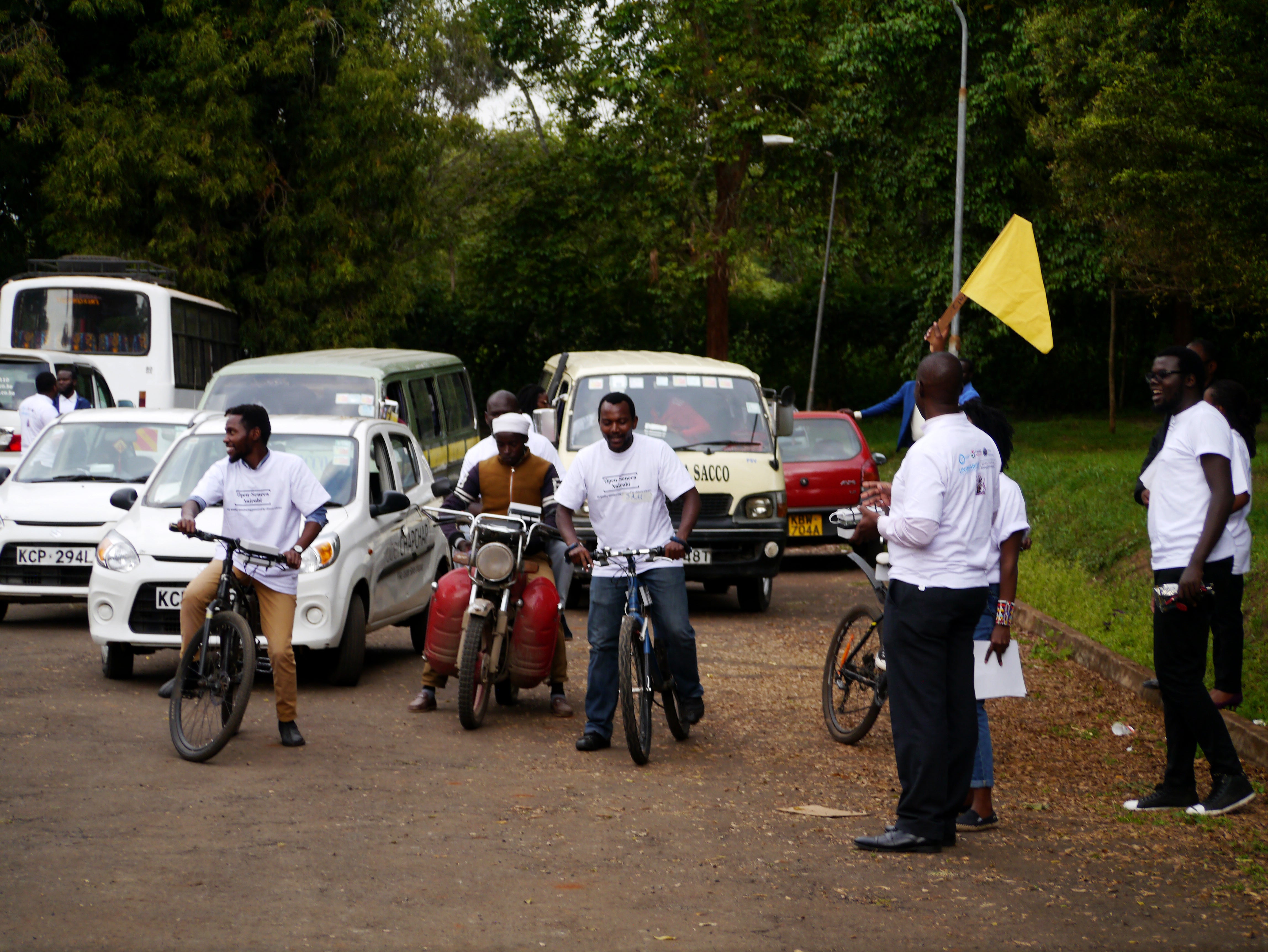 Waving goodbye to the vehicle drivers and bicycle rides