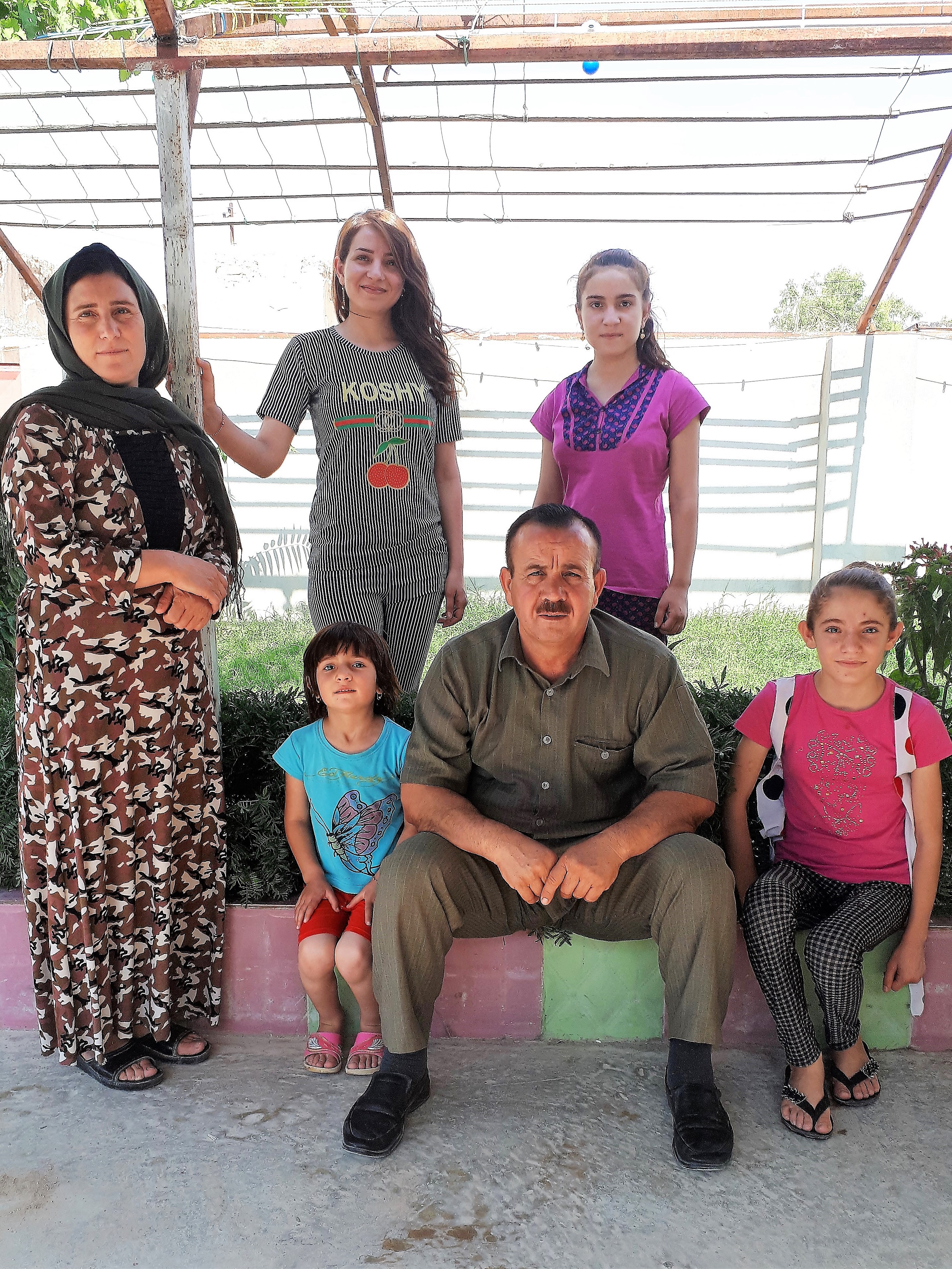 Hazem and his family, Sinjar, Northern Iraq, July 2019