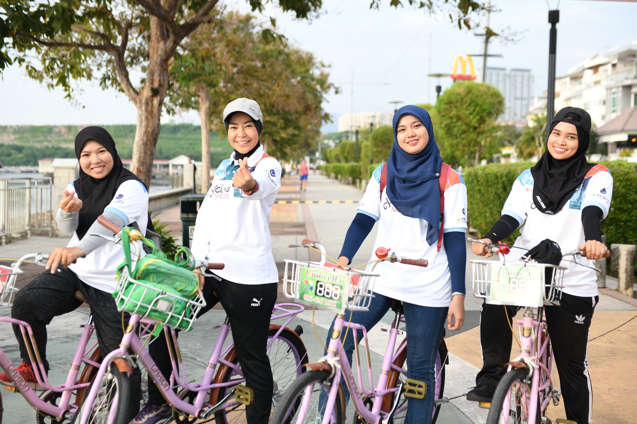 Mayors cycling thorugh the streets of Penang