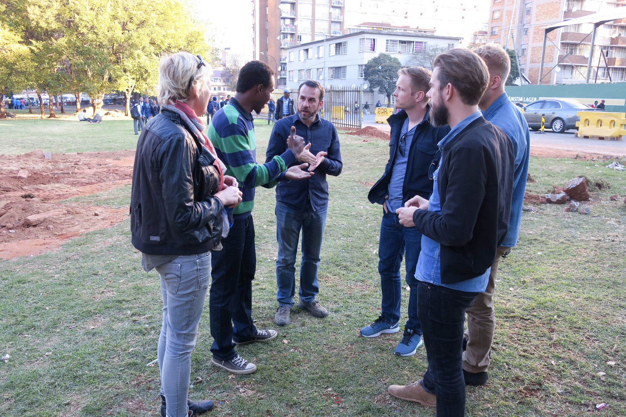 Project partners discuss the public space challenges in the Braamfontein district of Johannesburg before piloting the mixed reality technology.