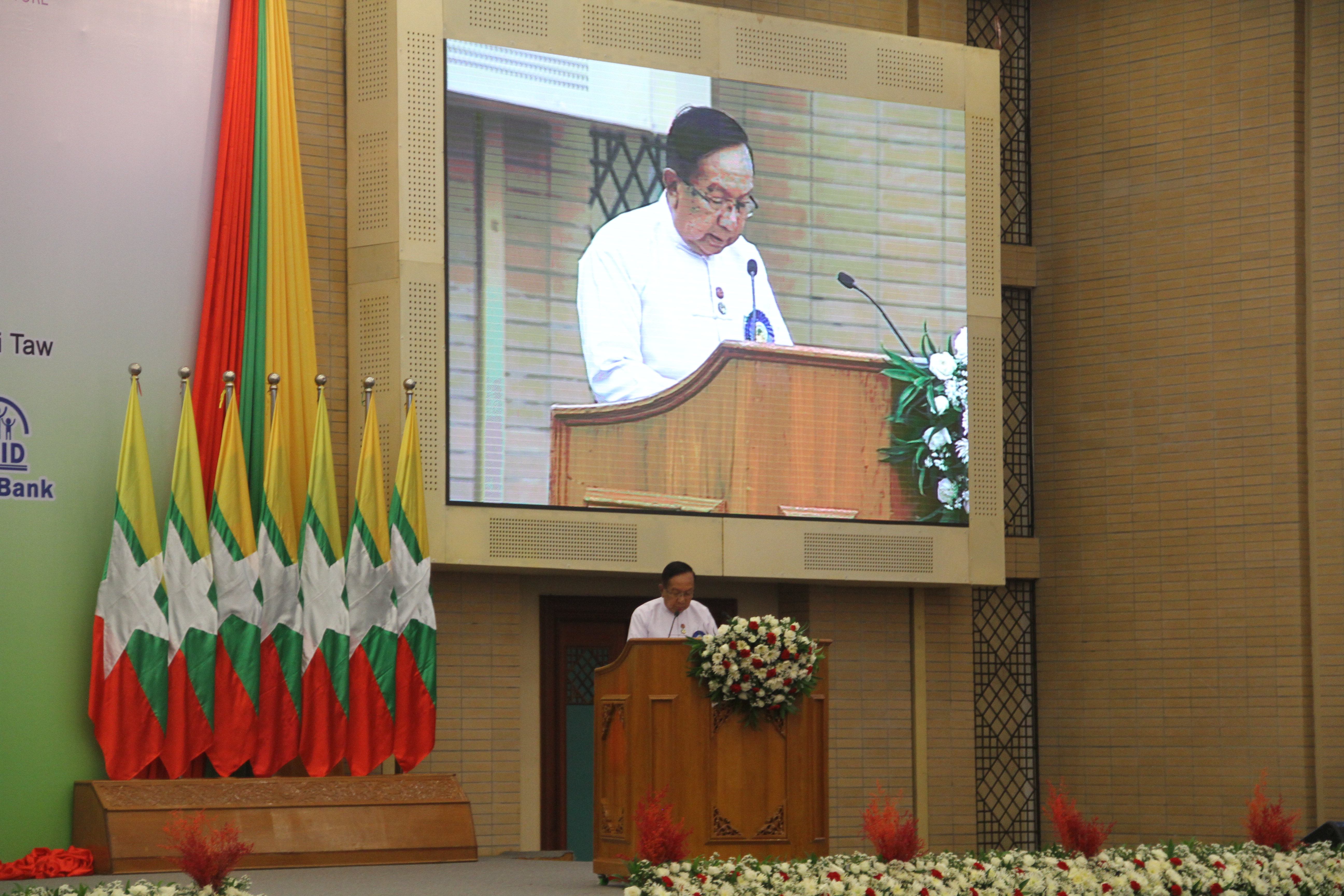 Union Minister of Ministry of Construction H.E. U Han Zaw delivering the Opening Address