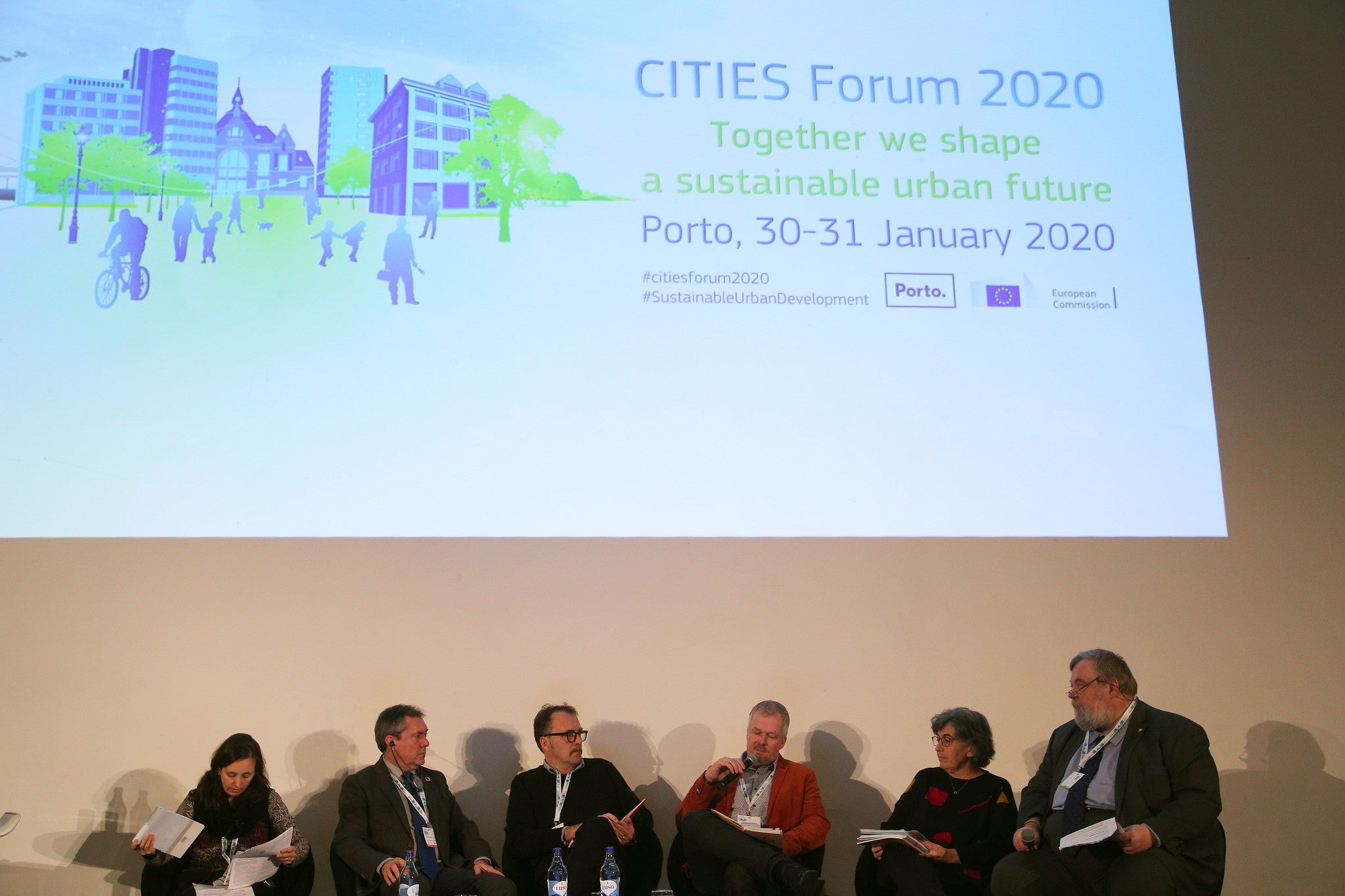 Panelists debate on how to implement the Sustainable Development Goals in cities. From left to right: (interpreter of the mayor); Mr Juan Espadas Cejas, Mayor of Seville; Giovanni Ferrero, city of Turin; Johannes Krassnitzer, UNDP; Laura Petrella and Paulius Kulikauskas, UN-Habitat