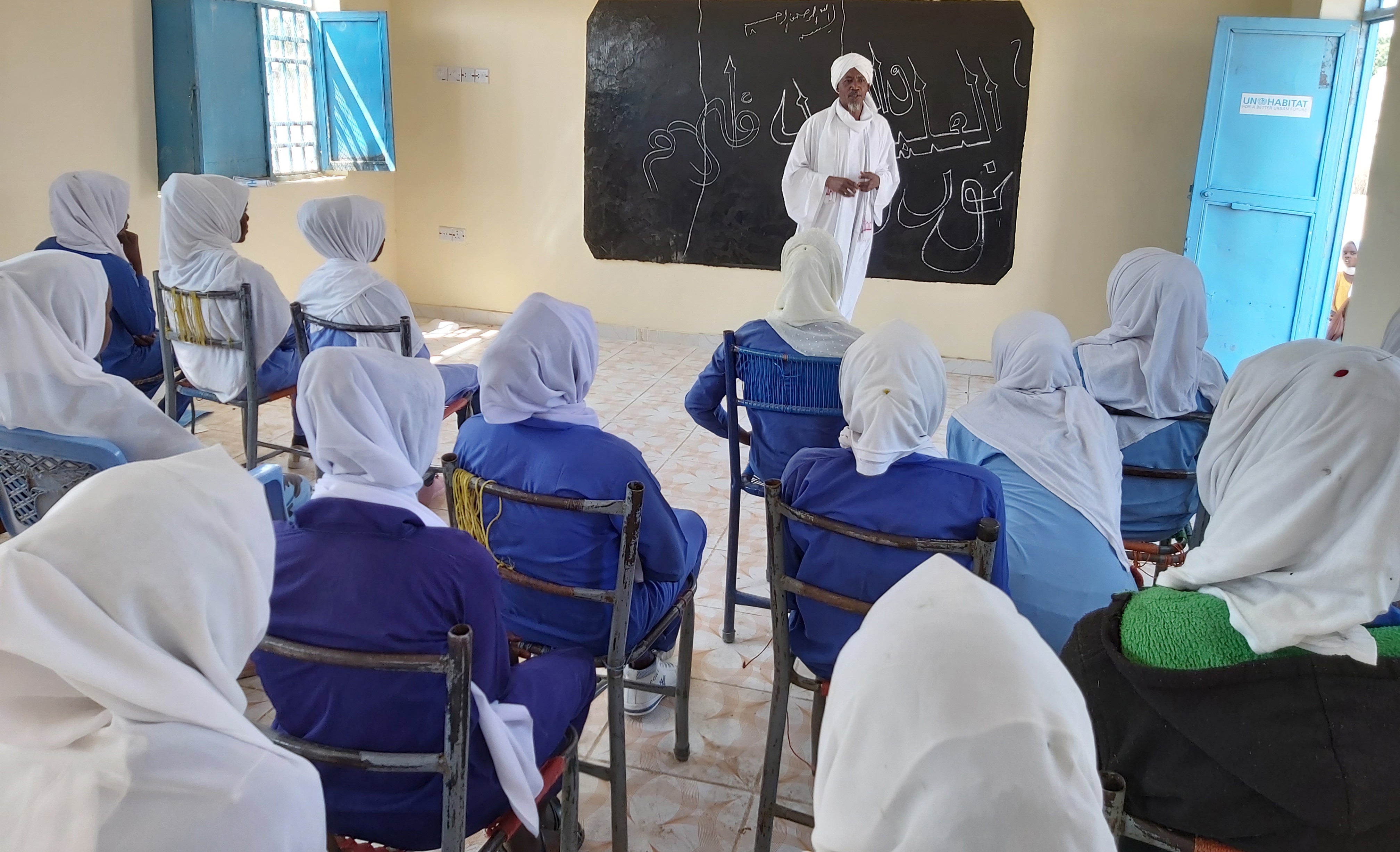 A lesson takes place in a new classroom in the school.