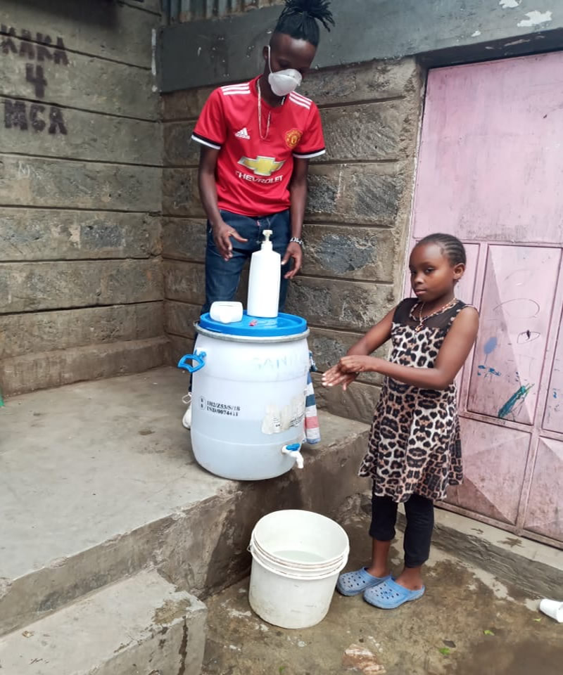 In Kenya’s informal settlement Mathare 10-year old Tabitha Muthoni washes her hands at the new facility set up by the Mathare One Stop Centre to combat the spread of COVID-19