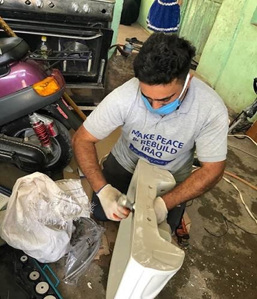 trainee working on a handwash basin