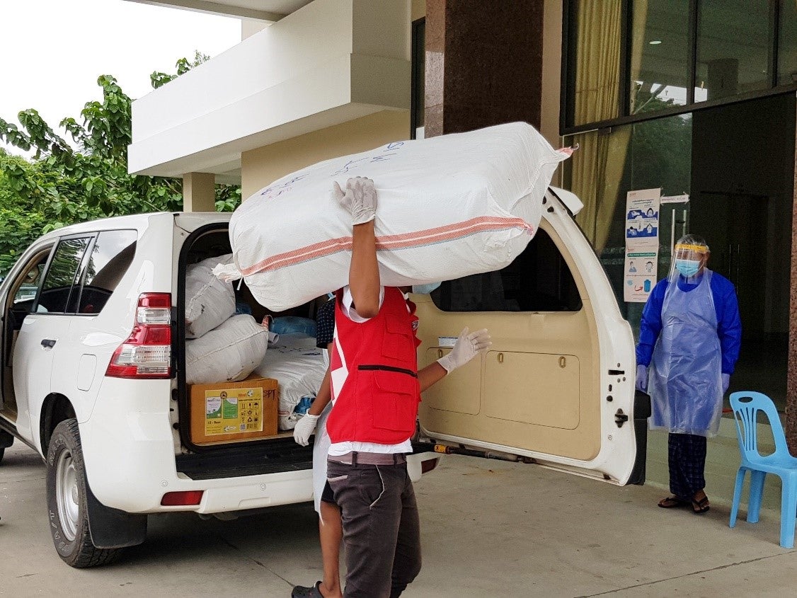 UN-Habitat Staff members deliver PPE to the Shyepyitha fever clinic as part of efforts to fight the Covid-19 pandemic