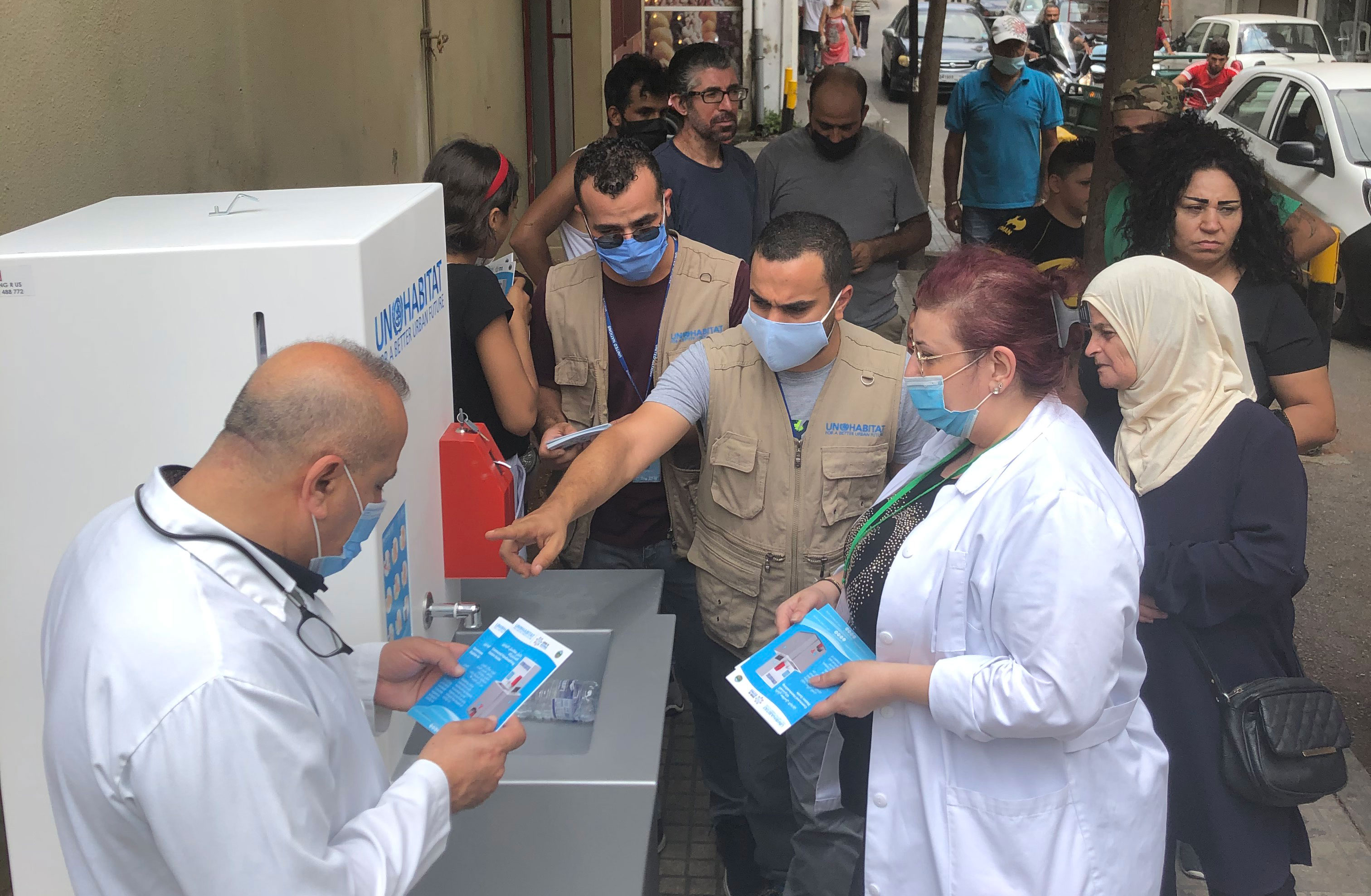 UN-Habitat team raising awareness on use of the communal handwashing station in Bourj Hammoud, Mount Lebanon