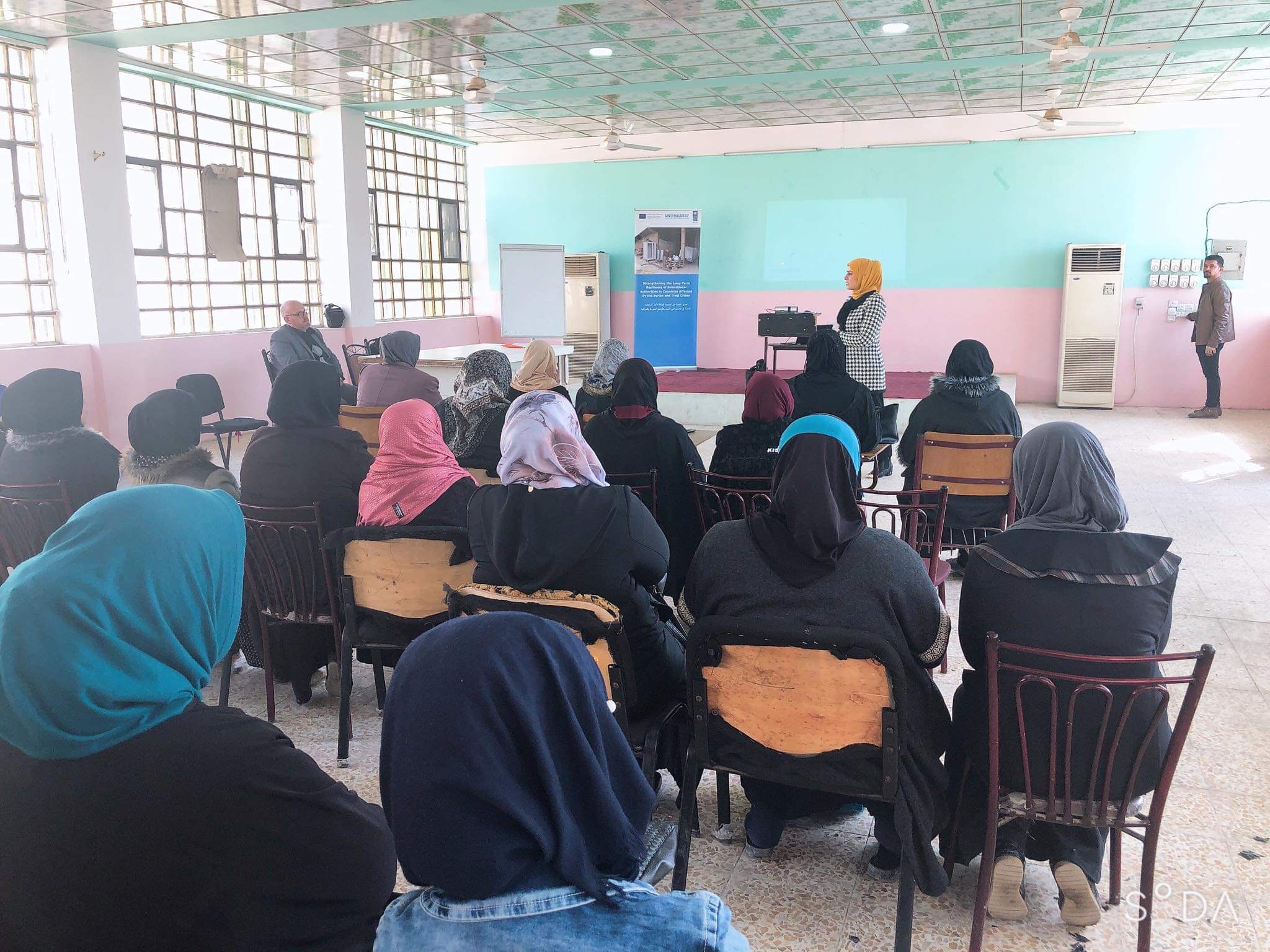 Women attend a focus group in Mosul held as part of UN-Habitat's Headway Programme.