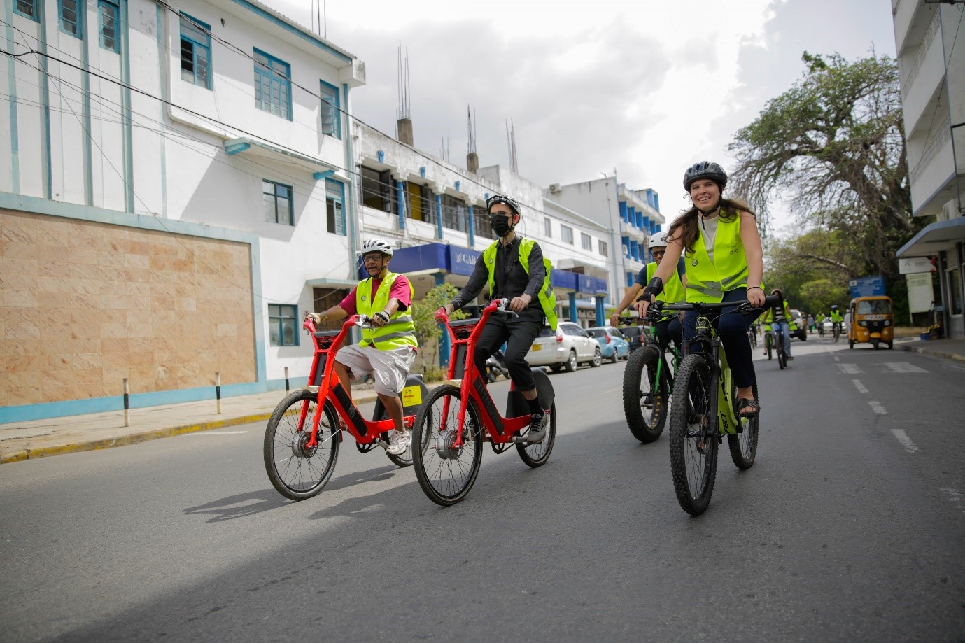 From left to right, Vipul Patel (County government of Mombasa), Chris Kost (ITDP) and Janene Tuniz (UN-Habitat) cycle on the streets of Mombasa  Photo: Simon Onyango Odhiambo