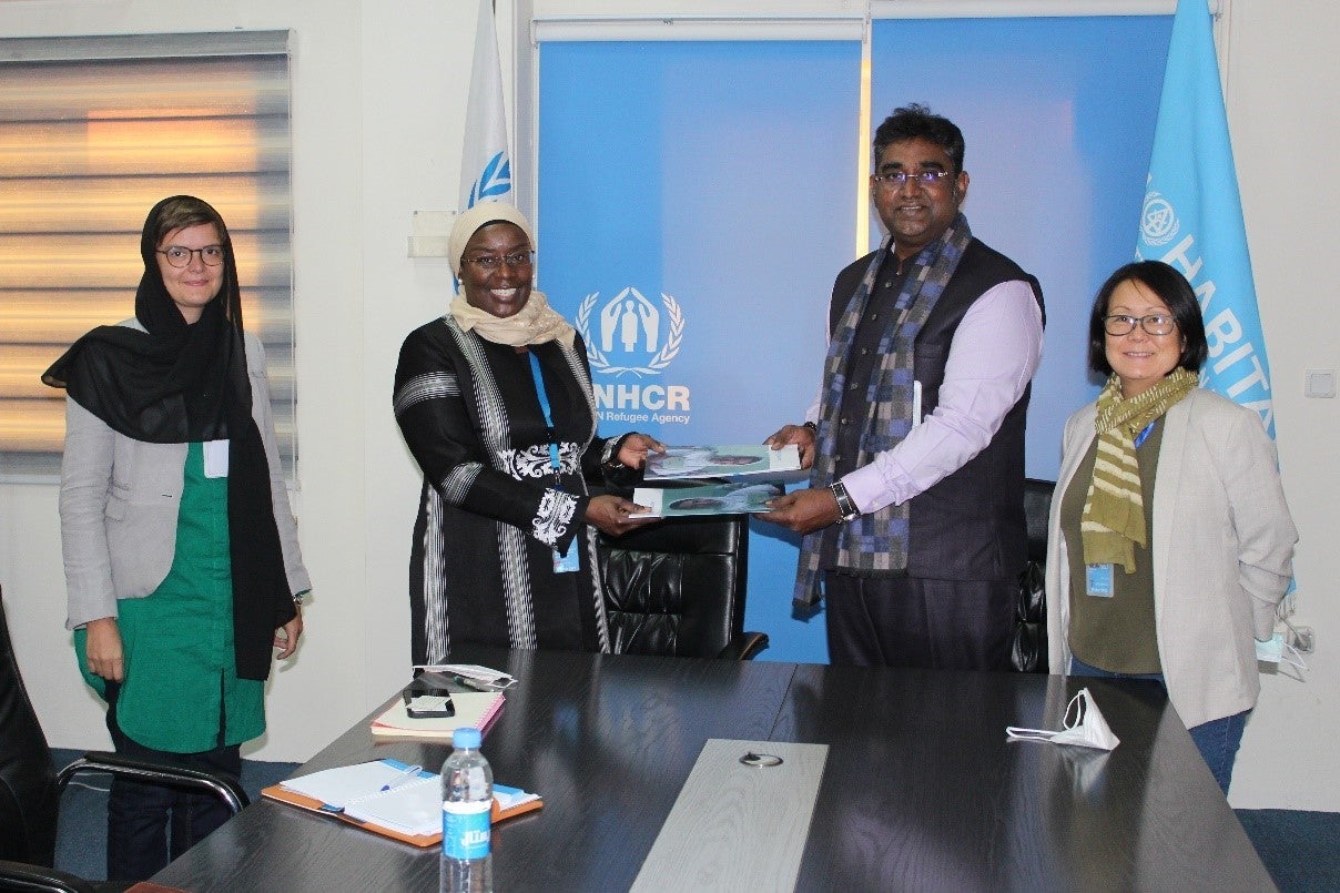 Signing agreement of joint project between UN-Habitat and UNHCR. Photo: UN-Habitat