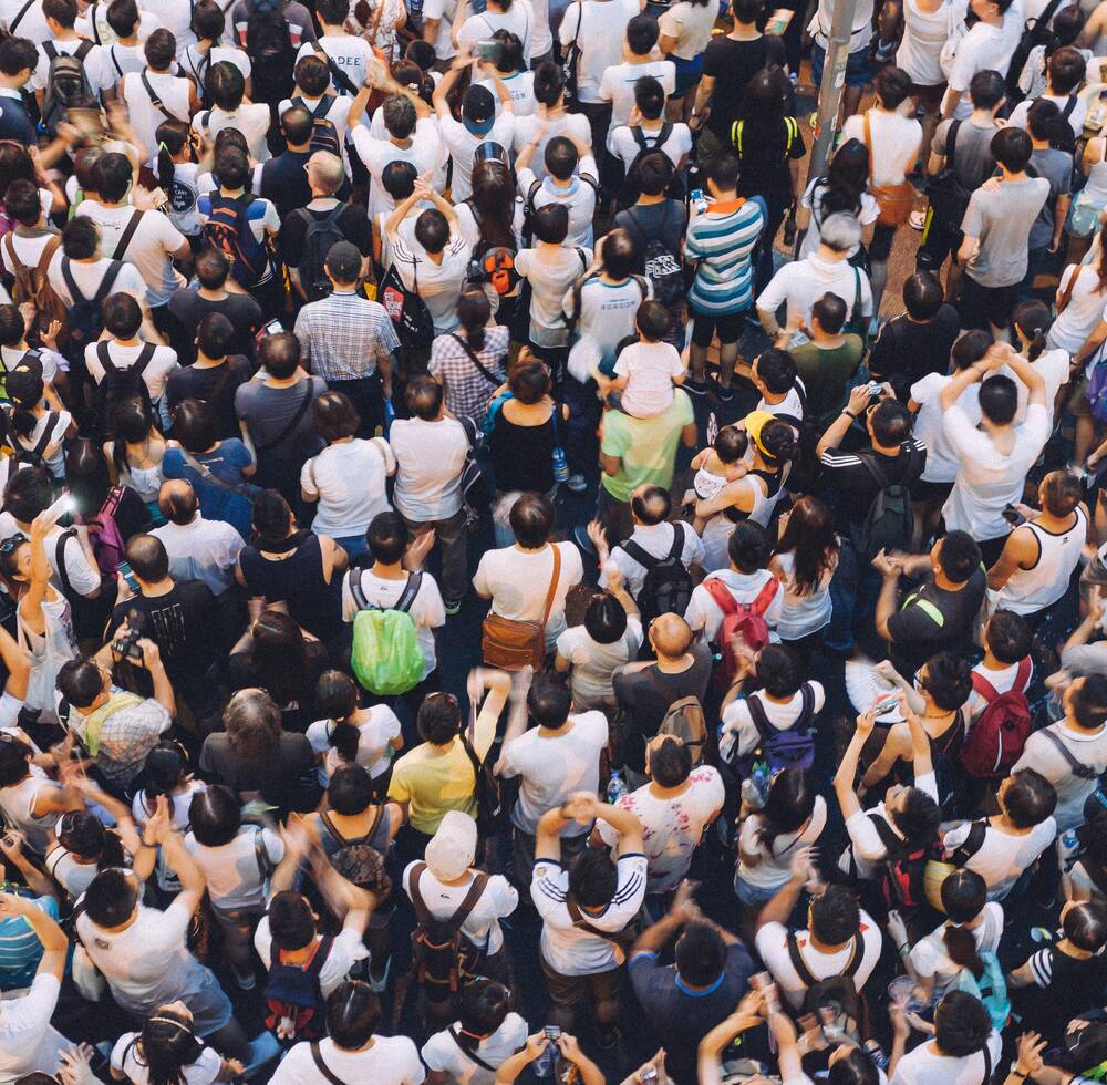 A crowd of people seen from above.