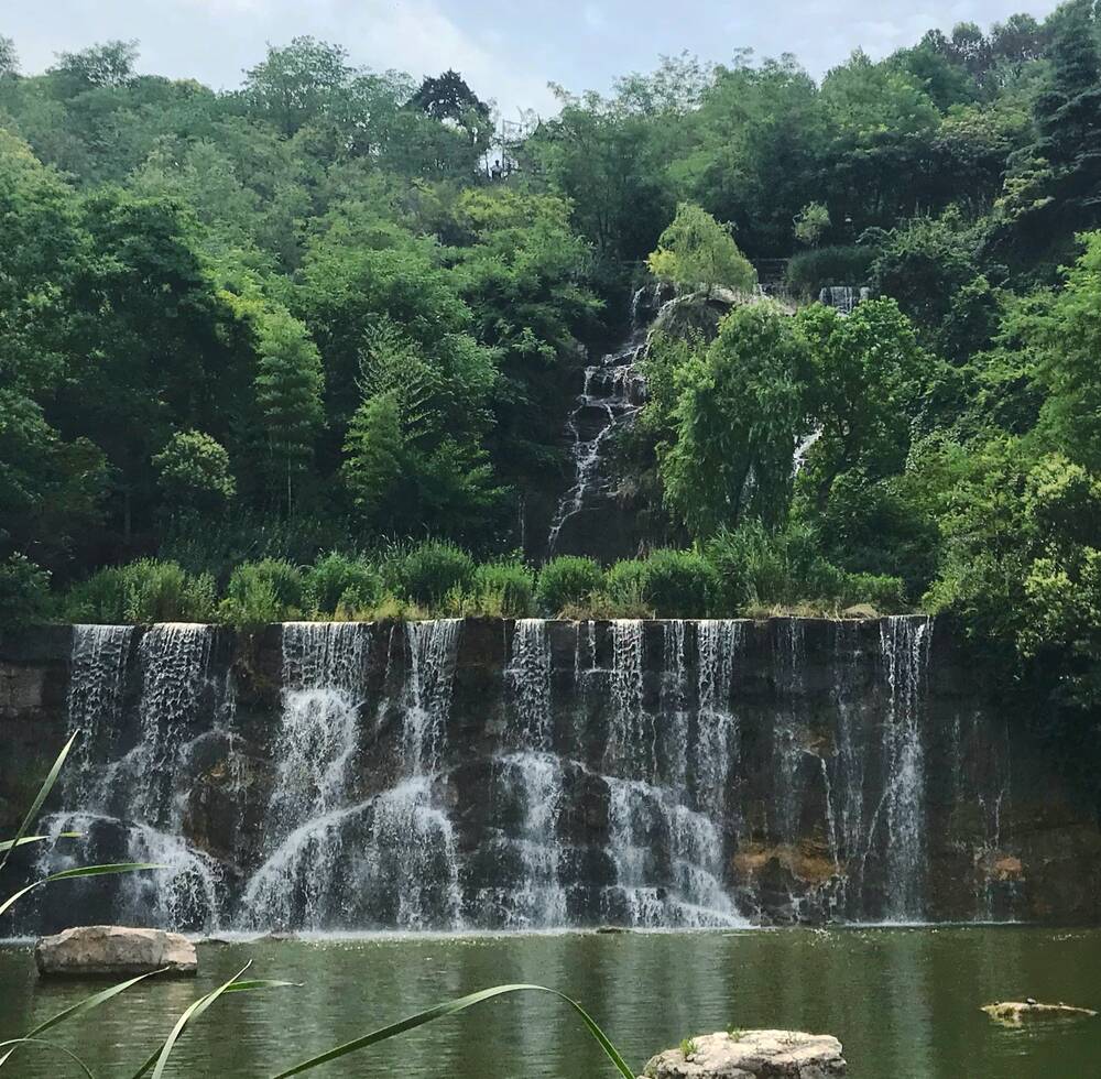 Xuzhou’s Quarry-Pit Park. A stone quarry was closed and environmentally re-landscaped starting 2009. It is now a popular city park.