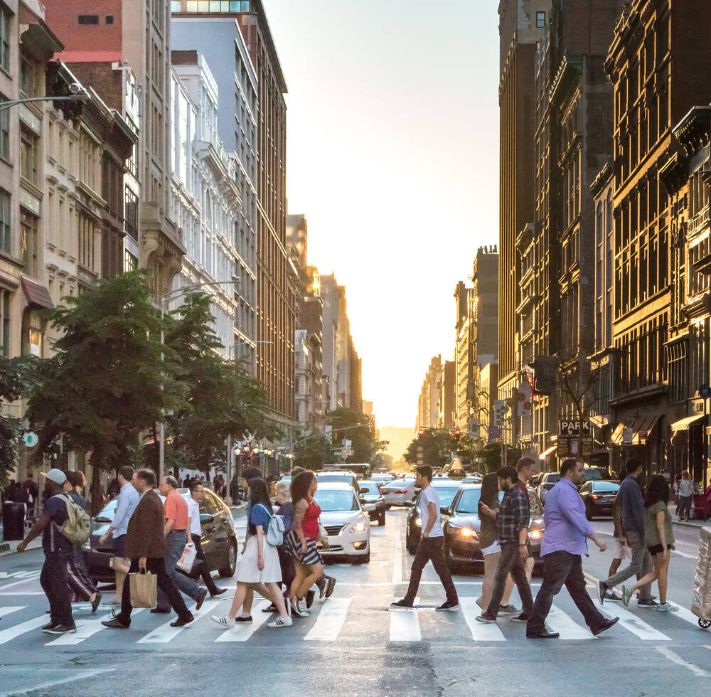 People crossing a road in New York city.