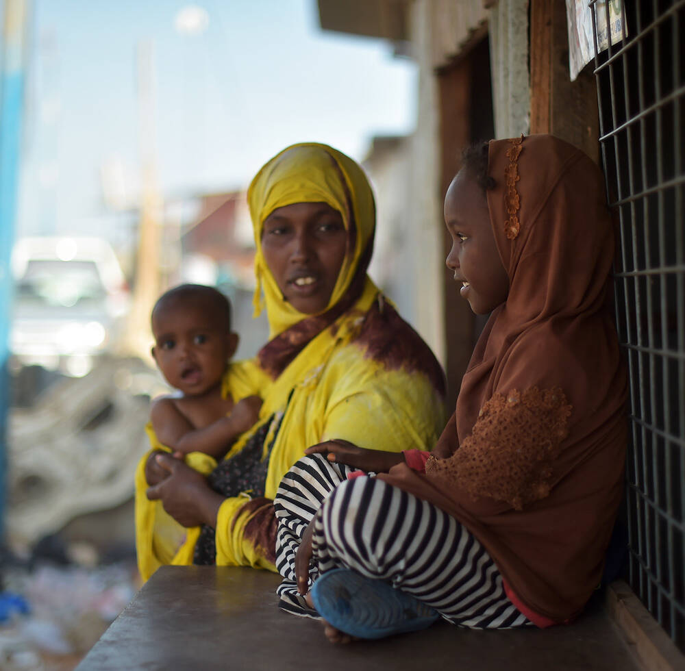 A mother speaks with her daughter on the outskirts of Mogadishu, Somalia, on March 6, 2017