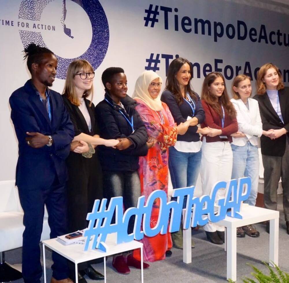 he UN-Habitat Executive Director with participants  at the Young Women Climate Changemakers session, at the UN Climate Change Conference in Madrid