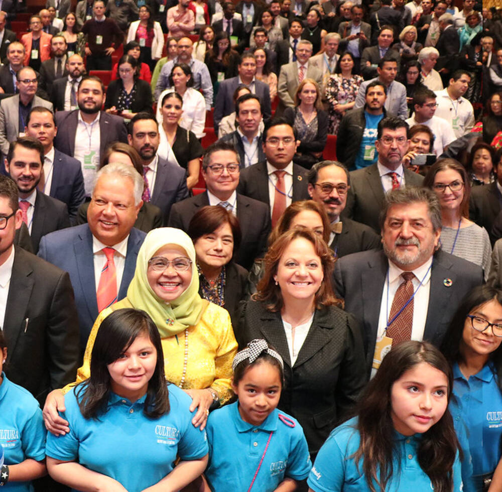 UN-Habitat Executive Director Maimunah Mohd Sharif with participants at the Global Observance of World Habitat Day 2019 in Mexico City, Mexico including a children's orchestra Rey Poeta