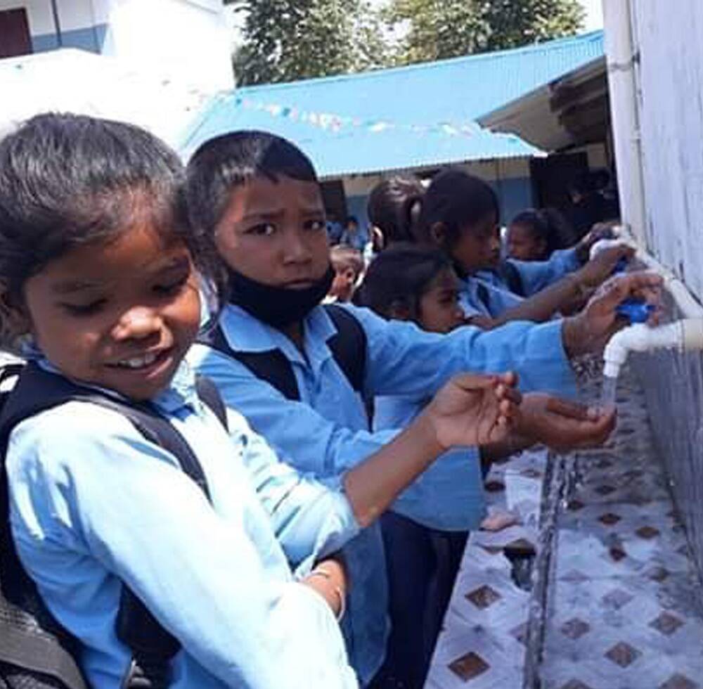 School children practicing proper hand washing at their school in Gaurigunj, Jhapa, Nepal 