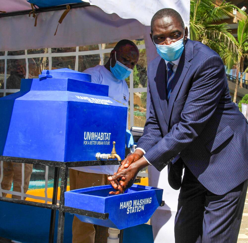 Testing one of the new handwashing stations during the Nairobi launch of UN-Habitat’s second phase of its response to COVID-19 in Kenya  UNHabitat/Julius Mwelu