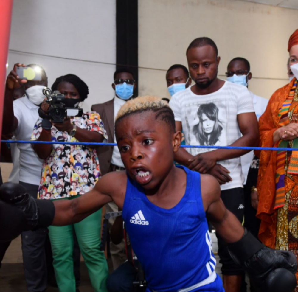 The United Nations Deputy Secretary-General Amina J. Mohammed watches children training at a boxing gym in an informal settlement in the Ghanaian capital Accra