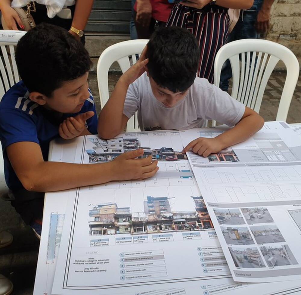 Children from Maraach neighbourhood participate in the community consultation session in 2019