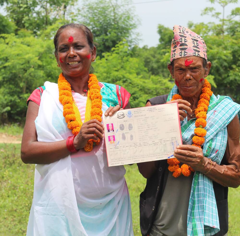 A couple receiving their Joint Land Ownership Certificate in Dang, Nepal