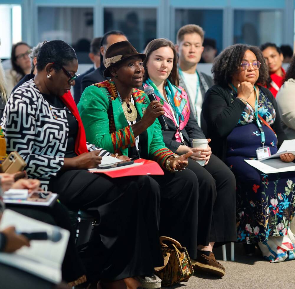 A stakeholder shares her perspective during the Women’s Caucus meeting at WUF13. © UN-Habitat