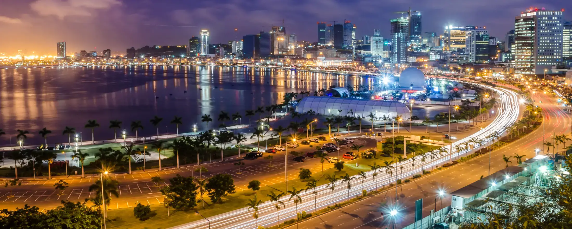 Skyline of capital city, Luanda, Luanda bay and seaside promenade with highway during afternoon, Angola, Africa