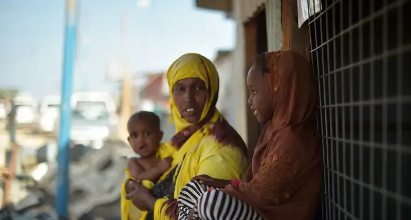 A mother speaks with her daughter on the outskirts of Mogadishu, Somalia, on March 6, 2017