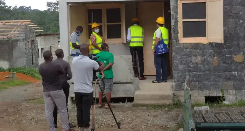 Workers on site at the housing project in Principe