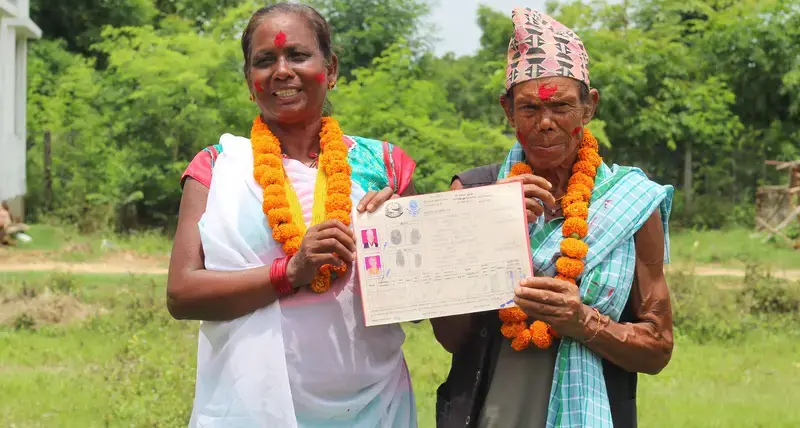 A couple receiving their Joint Land Ownership Certificate in Dang, Nepal