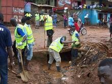 Youth doing community cleaning