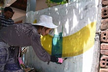 Korean artist paintin in Tam T